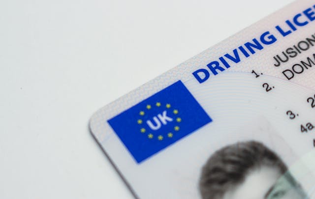 A close-up of a UK citizen’s driver’s license.